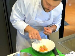 Garnish the melons with prawns before adding soup