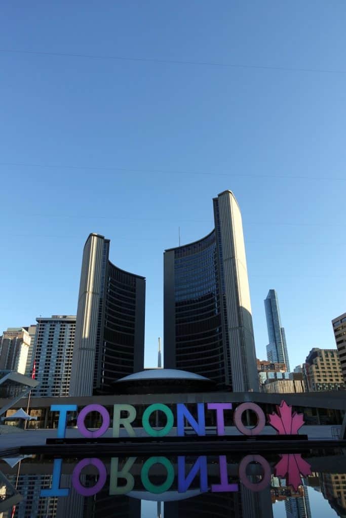 How to Stay Connected Across North America Without Swapping SIMs (Step-by-Step) 2 The Toronto Sign